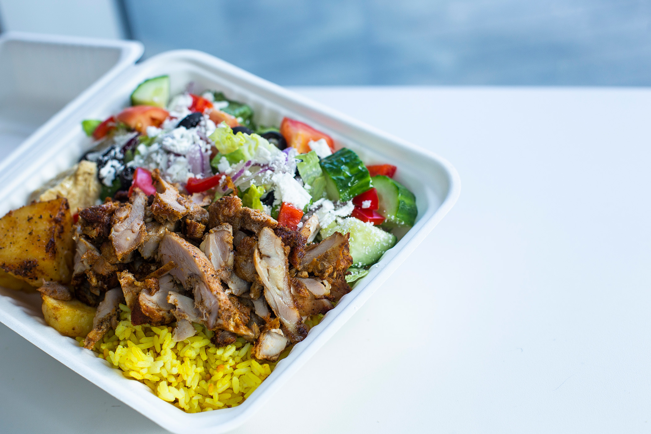 Chicken, rice and salad container